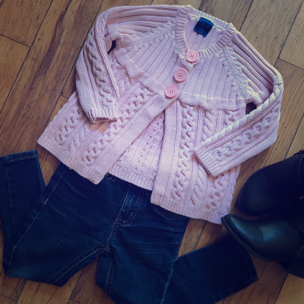Pink cable-knit 3-button sweater